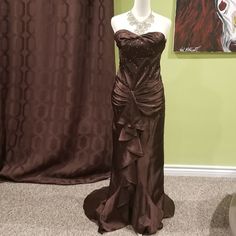 Chocolate Brown, Strapless, Formal Beaded Dress By Nox Has Sequin, Crystals, Ruffles And A Train. Size: Small, However, The Dress Have Been Altered To Fit A Size 3-4, 34b, 5'2 Build. Mannequin Size: 2-4. There Are Some Slight Marks On Different Parts Of The Dress Which Might Be Due To Wearing Greasy Body Cream, Which Can Be Seen In The 4th And 5th Photos, But It's Difficult To See. The Dress Can Be Zipped All The Way Up But I Did Not Want To Force It. Materials: 100% Polyester Care Instructions: Dry Clean Only Tvd Dresses, Brown Dresses Formal, Dress With Ruffles, All The Way Up, Brown Dress, Dresses Formal, Beaded Dress, A Train, Body Cream