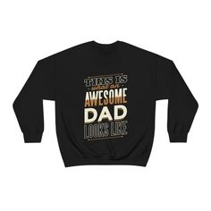 This is an Awesome Dad Sweatshirt| funny dad sweatshirt, fun dad clothing that He will love, Gift for dad, Dad Shirt from daughter Warm and Comfy sweatshirt that He Will Love! FREE SHIPPING Ideal for any situation, a unisex heavy blend crewneck sweatshirt is pure comfort.  These garments are made from polyester and cotton.  This combination helps designs come out looking fresh and beautiful.  The collar is ribbed knit, so it retains its shape even after washing.  There are no itchy side seams on these sweaters. 50% cotton, 50% polyester Medium-heavy fabric (8.0 oz/yd² (271.25 g/m Loose fit Sewn-in label Runs true to size MADE IN THE USA Thanks For Making TLC Part Of Your Gift Giving Father's Day Long Sleeve Relaxed Fit Sweatshirt, Long Sleeve T-shirt With Letter Print For Father's Day, Father's Day Long Sleeve Letter Print T-shirt, Father's Day Long Sleeve T-shirt With Letter Print, Family Matching Crew Neck Sweatshirt For Father's Day, Long Sleeve Top With Text Print For Father's Day, Father's Day Casual Graphic Sweatshirt, Casual Graphic Print Sweatshirt For Father's Day, Father's Day Relaxed Fit Letter Print Sweatshirt