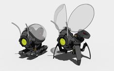 two futuristic flying insect like objects with yellow lights on their heads and legs, facing each other