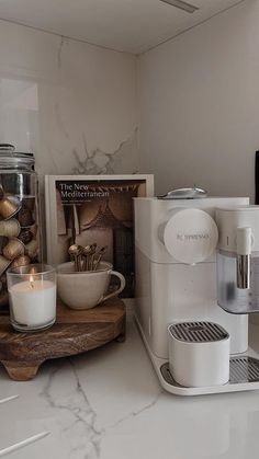 a coffee maker sitting on top of a counter