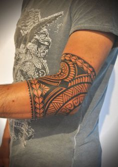 a man with a tattoo on his arm is shown in an instagramture photo