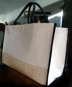 This large, heavy duty two-colored burlap bag is made of Jute and Cotton Blend. The fine blend of both jute and cotton give Juco (Jute & Cotton Mix) an edge on both materials, hard-wearing durability, smooth touching, and detailed printing opportunity. Each bag has matching thick rope handles and two matching woven lightweight straps which can be tied to close the top of the bag. These sturdy jute tote bags are perfect for grocery shopping, beach or pool visits, daily use, travel, work, arts & c Jute Tas, Colored Burlap, Jute Tote Bag, Burlap Tote Bags, Burlap Flower, Sac Diy, Burlap Tote, Burlap Bags, Jute Tote Bags