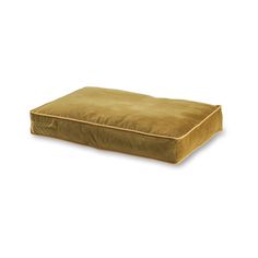 a brown dog bed on a white background