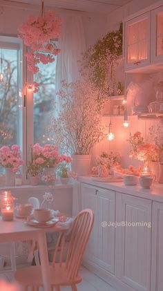 a dining room filled with lots of pink flowers