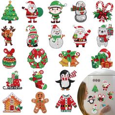 a woman looking at christmas decorations on a refrigerator with an image of santa claus and snowmen