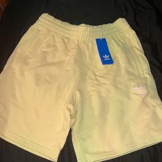 Never Worn, Mens Adidas Shorts With Yellow Tint, Size Is Medium, True To Actual Size. Also Have Zip Up Pockets Which Are Extremely Helpful. Look Amazing! Adidas Cotton Bottoms With Built-in Shorts, Adidas Shorts With Pockets For Spring, Adidas Green Casual Bottoms, Adidas Green Bottoms For Spring, Green Adidas Cotton Bottoms, Casual Green Adidas Bottoms, Adidas Green Bottoms For Summer, Adidas Cotton Shorts For Spring, Adidas Cotton Bottoms For Summer