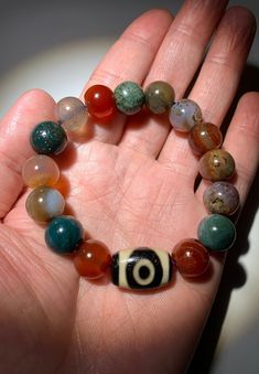 "Tibetan Agate Dzi Beads \" 2 Eyes \" Amulet Bracelet # T612766 DZI Size About : 19mm x12.9mmx10.5mm(Oblate bead) Agate Size About : 11.8mmEach Bead(Total 15 Beads) The buyers are responsible for the customs & duties if it may apply." Spiritual Agate Round Bead Bracelets, Spiritual Round Beaded Bracelets With Polished Beads, Multicolor Agate Beaded Bracelets With Round Beads, Spiritual Beaded Bracelets With Polished Beads, Multicolor Agate Bracelets With 8mm Beads, Multicolor Agate Beaded Bracelets, Multicolor Agate Beads Jewelry 8mm, Multicolor Agate Round Beaded Bracelets, Spiritual Round Polished Beads Bracelet