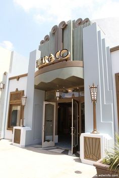 the entrance to an art deco style building