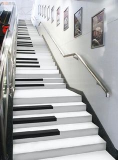 the stairs are painted white and have black and white piano keys on each one side