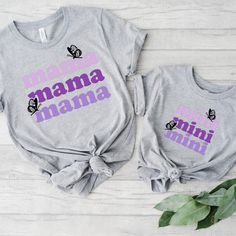 This is such a fun graphic matching tee for all the loving Moms who love to get matching tee's with her kids. The can be a great gift for Mother’s Day or Christmas. These cute matching graphic tee's can be customized in your choice of vinyl colors. All garments are offered in three colors, these come in a variety of sizes of your choice. We use high quality, soft flex vinyl which not only creates a sharp, vivid graphic but will never look "faded" or “washed out” like some inks commonly do. Proce Cute Letter Print T-shirt For Playtime, Fun Letter Print Tops For Family Occasions, Unisex Family Matching T-shirt With Screen Print, Playful Funny Print Family T-shirt, Spring Letter Print T-shirt For Playtime, Cotton T-shirt With Text Print, Playful Cotton Family T-shirt, Unisex Family T-shirt With Name Print, Unisex Family Name Print T-shirt