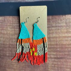 Seed Bead Dangle Earrings Teal And Orange Ear Hook New Casual Multicolor Dangle Jewelry, Colorful Dangle Beaded Earrings For Beach, Multicolor Teardrop Casual Jewelry, Casual Multicolor Teardrop Jewelry, Casual Multicolor Dangle Beaded Earrings, Casual Multicolor Beaded Dangle Earrings, Casual Multicolor Teardrop Earrings, Orange Beaded Dangling Earrings For Summer, Orange Beaded Dangling Earrings For Beach