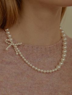 Editor's NotesCoexistence space of contemporary and classic sensibility.- Hand-made necklace - Ribbon pearl point- Feminine design - Goes well with dressy look Measurements(in.)One Size- Size: 16.53 + 1.18 in.- Ribbon Pearl Size: 0.15 in./ 0.19 in.- Swarovski Pearl: 0.19 in./ 0.23 in./ 0.31 in./ 0.39 in.Composition & Care- Material: Swarovski Pearl,Brass- Please be careful that discoloration may proceed faster in chemical substances, water, and heat.- After wearing a Handmade Jewelry Diy Bracelets, Diy Necklaces Tutorial, Diy Choker, Pearl Ribbon, Chemical Substances, Necklace Tutorial, Jewelry Diy Bracelets, Ribbon Necklace, Pearl Bag