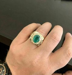 5.70 Carats Natural Emerald and Diamond 14K Solid Yellow Gold Men's Ring Amazing looking piece! Suggested Replacement Value: $8,000.00 Total Natural Round Cut Diamonds Weight: Approx. 0.70 Carats (color G-H / Clarity SI1-SI2) Total Natural Emerald Weight is: Approx. 5.00ct Emerald Measures: Approx. 12.00 x 10.00mm Emerald Treatment : Oiling Ring Weights: 12.00 grams Disclaimer: all weights, measurements and colors are approximate and may vary slightly from the listed dimensions or as seen in the Antique Mens Rings, Emerald Cut Aquamarine Ring, Yellow Gold Mens Rings, Expensive Rings, Antique Necklaces Design, Jewellery Design Sketches, Emerald Cut Rings, Gold Rings Fashion, Men's Ring