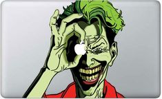 the joker macbook decal has been drawn on to it's back cover