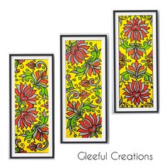 three framed art pieces with different designs on the wall and below them is an image of flowers