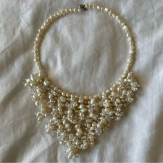 What: Choker Necklace With Beautiful White/Cream Baroque Pearls And Crystals!! The Detail And Intricacy In This Is Incredible. A Way To Elevate An Outfit Or A Tshirt For Sure!!! Condition: Nwot. No Marks, Stains, Rips, Weird Smells Or Any Major Signs Of Wear! White Pearl Bib Necklaces For Party, White Pearl Bib Necklace For Party, Elegant White Pearl Bib Necklace, Elegant Beaded Beige Necklace, Elegant Cream Beaded Bridal Necklace, Cream Pearl Necklaces For Party, Elegant Cream Beaded Necklaces With Pearl Drop, Cream Beaded Pearl Necklace For Party, Cream Pearl Jewelry For Party