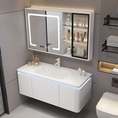 a bathroom with a sink, mirror and toilet