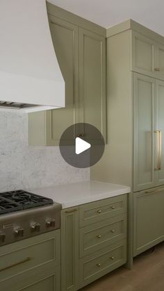 a kitchen with green cabinets and white counter tops