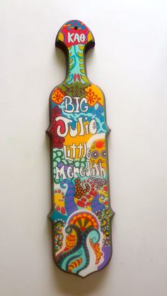 a colorful bottle shaped magnet with the words,'big smile little mermaid'on it