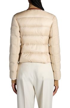 Leather trim lends an equestrian-inspired element to this hybrid jacket that pairs woolly bouclé with channel-quilted, down-filled nylon. Two-way front-zip closure Jewel neck Front welt pockets Partially lined, with down fill 36% virgin wool, 25% alpaca, 14% mohair, 13% polyester, 12% poyamide with 100% polyamide contrast Dry clean Imported Designer Clothing Winter Outerwear With Padded Shoulders, Winter Workwear Outerwear With Padded Shoulders, Designer Fitted Puffer Jacket With Padded Collar, Fitted Designer Puffer Jacket With Padded Collar, Luxury Fitted Quilted Outerwear, Designer Cream Outerwear For Winter, Soft Beige, Jewel Neck, Leather Trim