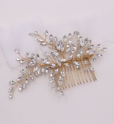 "New design! Add that finishing touch with this elegantly designed handmade wedding hair accessory featuring sparkling crystal rhinestones. Set in a rose gold finish, this stunning comb measures 5\" wide by 3\" tall (at the widest point). This comb would be perfect as a side accent or back comb wedding hair accessory. Choose from silver, gold or rose gold finish. Available in all crystals or with accenting freshwater pearls. Orders are shipped via USPS with tracking and confirmation. Item arrive Gold Hair Comb Wedding, Crystal Comb, Wedding Comb, Diamond Hair, Gold Hair Comb, Pearl Hair Combs, Rhinestone Rose, Rhinestone Hair Comb, Crystal Hair Comb