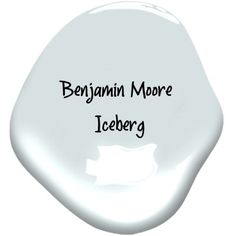 a white toothbrush with the words benjamin moore iceberg on it's side