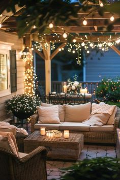 an outdoor living area with lights and wicker furniture