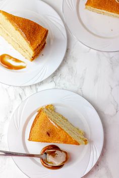 three plates with slices of cake on them and caramel sauce in front of them