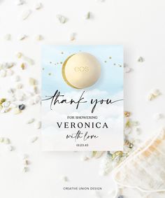 the thank you card is surrounded by confetti and paper flowers on a white surface