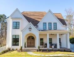 a large white house with two story windows