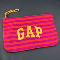 New Without Tags Or Like New Pencil Case / Pouch Made By The Gap. Orange And Pink Stripes With Yellow Lettering. G1 Casual Pink Pouch For School, Casual Pink School Pouch, Pink Rectangular Pouch With Pen Holders, Rectangular Pink Pouch With Pen Holders, Casual Pink Rectangular Cosmetic Bag, Trendy Pink Pouch For Personal Use, Trendy Pink Pouch For Gift, Trendy Pink Pouch As Gift, Trendy Rectangular Pink Pencil Case