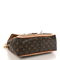 This is an authentic LOUIS VUITTON Monogram Dauphine Soft GM. This stylish shoulder bag is crafted of Louis Vuitton monogram on toile canvas. The bag features a vachetta shoulder strap, a gold chain strap, and a front facing flap with a vachetta trim, and a decorative brass Louis Vuitton logo clasp. This opens to a partitioned brown microfiber interior with zipper and patch pockets. Louis Vuitton Logo, Louis Vuitton Monogram Bag, Félicie Pochette, Louis Vuitton Crossbody Bag, Louis Vuitton Crossbody, Pochette Metis, Louis Vuitton Empreinte, Embroidered Monogram, Stylish Shoulder Bag