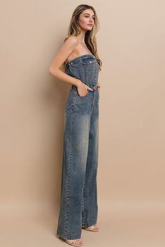 STRAPLESS CUTOUT DENIM JUMPSUIT – Signature Step Trendy Strapless Jumpsuit With Pockets, Trendy High Waist Strapless Jumpsuit With Pockets, Trendy Strapless High Waist Jumpsuit With Pockets, Casual Strapless Denim Jumpsuit With Pockets, Denim Blue Strapless Denim Jumpsuit Overall, Casual Medium Wash Strapless Denim Jumpsuit, Casual Cotton Strapless Jumpsuit With Pockets, Spring Denim Strapless Jumpsuit With Pockets, Casual High Rise Strapless Denim Jumpsuit