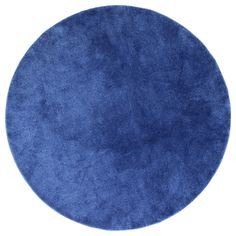 a round blue rug on a white background