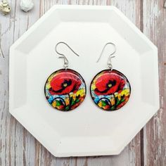 Red Flower Earrings With Colorful Stained Glass Background Bright Summer Jewelry Floral Accessory - Etsy Red Hand-painted Flower Earrings For Gifts, Red Pressed Flowers Earrings For Gift, Handmade Red Flower Earrings, Red Hand Painted Round Earrings, Artistic Red Round Earrings, Multicolor Floral Print Earrings For Gift, Gift Floral Print Multicolor Earrings, Artistic Red Resin Jewelry, Stained Glass Background