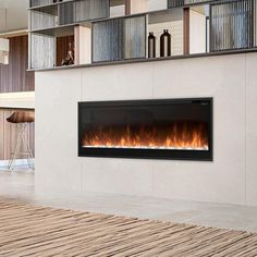 a modern fireplace in the middle of a living room