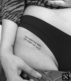 a pregnant woman's belly with the words you keep me safe written on it