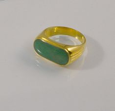 Unisex 18k Solid Yellow Gold Natural Cabochon Jade Ring  Size 9.5 / Weighs 8.2 Grams Ships USPS Priority Insured   Please See All Pictures And Ask Any  And All Questions Before Bidding Thank You For Looking And Please Check Out Our Other Auctions For More Estate Treasures All Of Our Items Are Available For Local Pick Up Formal Fine Jewelry Signet Ring With Cabochon, Formal Cabochon Signet Ring, Formal Gold Cabochon Signet Ring, Formal Yellow Gold Signet Ring With Oval Cabochon, Modern Yellow Gold Signet Ring With Cabochon, Formal Hallmarked Oval Cabochon Signet Ring, Modern Gold Oval Opal Ring, Fine Jewelry Oval Cabochon Signet Ring For Formal Wear, Fine Jewelry Oval Cabochon Signet Ring For Formal Occasions