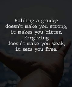 someone holding their hand up with the words holding a grudge doesn't make you strong, it makes you bitter