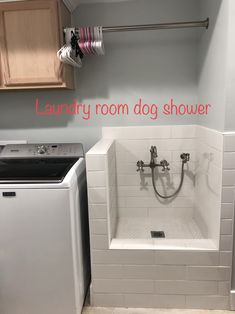 the laundry room dog shower is clean and ready for us to use in their home