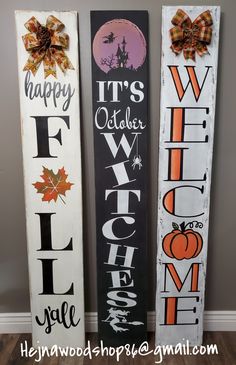 three wooden signs that say it's october and halloween