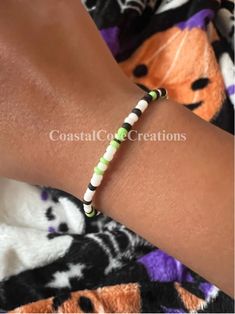 -----✰-----✰-----✰-----✰----- Happy Halloween!! 🎃 -----✰-----✰-----✰-----✰----- ╭-------✰-------  | * New LIMITED EDITION    | * Halloween bracelets have    | been released!!  | * Our new bracelets are super   | high quality and stretchy! ╰-------✰------- -----✰-----✰-----✰-----✰----- Size: 6.5 inches!✨  since they are stretchy, this size fits most wrists -----✰-----✰-----✰-----✰-----  ╭-------✰-------✰-------   | Bracelet care!👻   | * DO:    Keep it in a safe place!    Keep out of reach from White Beaded Bracelets For Halloween, Handmade White Beaded Bracelets For Halloween, Green Themed Beaded Bracelets, Handmade White Beaded Rave Bracelets, White Handmade Beaded Bracelets For Rave, White Themed Beaded Bracelet, Handmade Casual Halloween Jewelry, Casual Handmade Halloween Jewelry, Casual Handmade Jewelry For Halloween