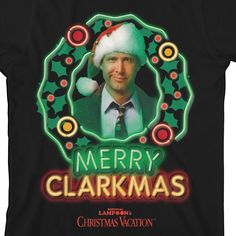 a man wearing a santa claus hat with the words merry clarkmas