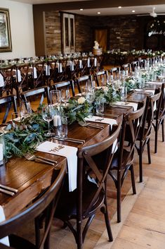 the long tables are set with place settings