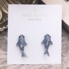 Deep Dive: It May Be A Fish Out Of Water, But These Amazing Kate Spade Pav Shark Studs Add A Flash Of Fierce Shimmer To Your Ears. You’ll Be Swimming In Style When You Wear These Fantastic Shark Stud Earrings, Created By Kate Spade New York. Material Rhodium Plated Metal With Glass Features Post Closure (For Pierced Ears) Details Measure: Approx. 0.80 Weight: 5.69g - Brand New, Never Used. - Includes Card And Dust Bag/Pouch. Details: Brand New With Card. Dust Bag Included Fish Out Of Water, Shark Earrings, Blue And White Style, California Dreaming, Studs Earrings, Spade Jewelry, Kate Spade Jewelry, Pierced Ears, Kate Spade New York