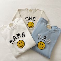 These smiley face family sweatshirts make the perfect 1st birthday party family outfit!  - They need to be purchased individually (it's not sold as a set) - Our sweatshirt material is super soft and comfy! ♡ - All our sweatshirts run a unisex fit. (Both for men and women). They are naturally oversized, so we normally recommend your true size. But if you like a more baggy look, we recommend sizing up. - These letters are iron-on patched and is heat pressed, not embroidered. - Please note that cre First Birthday Set Up, One Year Old Party Ideas, One Happy Baby First Birthday, Smiley Face Birthday Party, Birthday Shirts For Family, Smiley Birthday, Birthday Family Shirts, Family Sweatshirts, Boys First Birthday