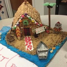 there is a cake made to look like a beach hut