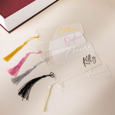 some tassels that are on top of a book