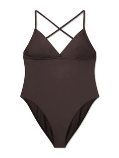 The Lola One-Piece is a minimalist dream come true. This impeccably cut swimsuit features a cross-front triangle neckline supported by adjustable cross-shoulder straps and a super low back. Moderate coverage at the back is complemented by a flattering leg cut mid-hip. Striking in measured simplicity, she's sure to be your go-to one-piece for in and out of the water worn. Made in Los Angeles of Italian fabric 88% recycled Econyl® / 22% Spandex Beachwear Swimwear With Wrap-around Strappy Back, Summer Crisscross Swimwear With Lined Body, Summer Swimwear With Cross-tied Back, Summer Swimwear With Cross-tied And Cross Back, Summer Cross-tied Swimwear With Cross Back, Beach Swimwear With Crisscross Wrap-around Straps, Beachwear Swimwear With Crisscross Wrap-around Straps, Chic Swimwear With Crisscross Straps For Swimming, Crisscross Wrap-around Straps Swimwear For Swimming