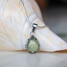 Natural Textured Prehnite 925 Sterling Silver Pendant Natural Gemstone Pendant Women Silver Jewelry Pear Shaped Pendant Pendant Necklace ❥ Gemstone - Prehnite Tear Drop.. ❥ Metal: 925 Sterling Silver ❥ Variation - You Can Choose Pendant Only / Pendant With Chain.  ❥ High-Quality Item ❥ Note - Chain Cost Extra 10 USD 925 Sterling Silver  ❥ Stone 10*14 MM ❥ Pendant Back Side is fully flat,  Side Body is fully tree style textured, Designed and Made By Blue Lead Jewellery.  ✈ Free Shipping (USPS) ✈ Silver Teardrop Pendant Necklace With Gemstone, Elegant Silver Teardrop Pendant Gemstone, Unique Nickel-free Necklace With Teardrop Pendant, Nickel-free Blue Teardrop Pendant Jewelry, Green Sterling Silver Pendant Gemstone, Pear Shaped Pendant, Gemstone Necklace Pendant, Natural Texture, Pear Shaped